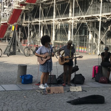 Some street artists performing just outside the museum. I loved her voice!